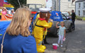 A high-five for Stormy Stan before the carnival parade