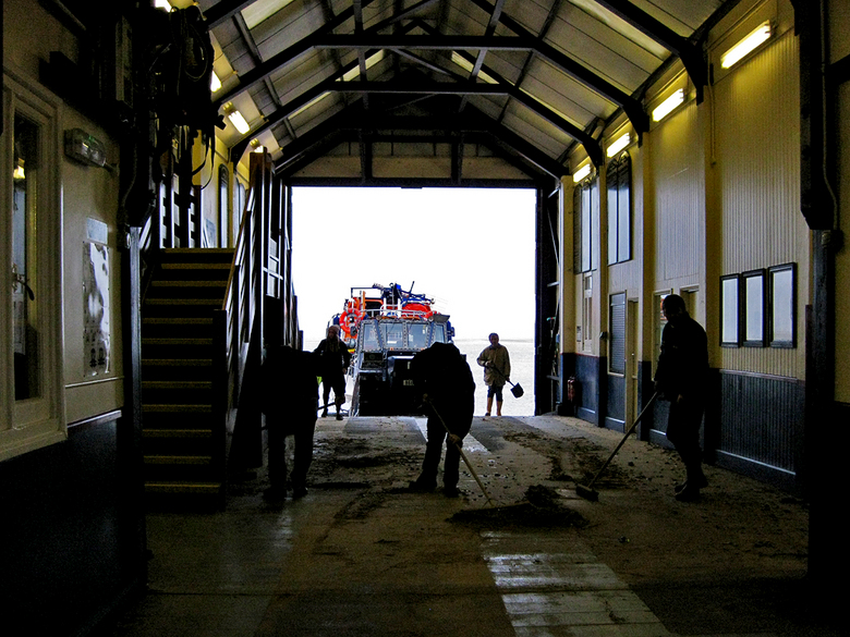 Cleaning up the boat hall after the surge tide 13/1/17