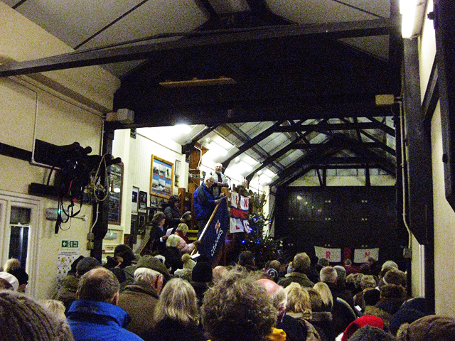 Usual crush in the boat hall for Christmas carols, 16 December 2018