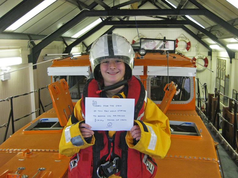 Merrick Gill visiting Wells Lifeboat station to donate 117 she raised selling cupcakes