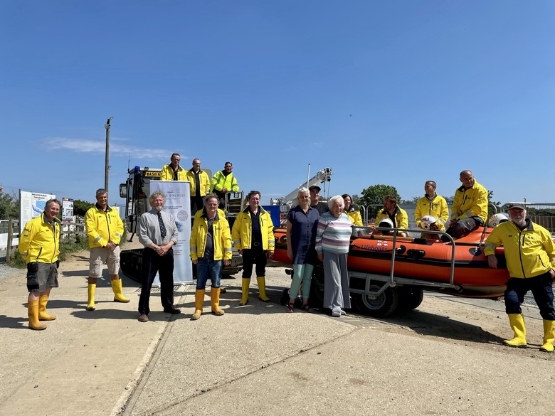 Fiona, Rob and Dorothy MacCallum with members of Wells lifeboat crew and the inshore lifeboat