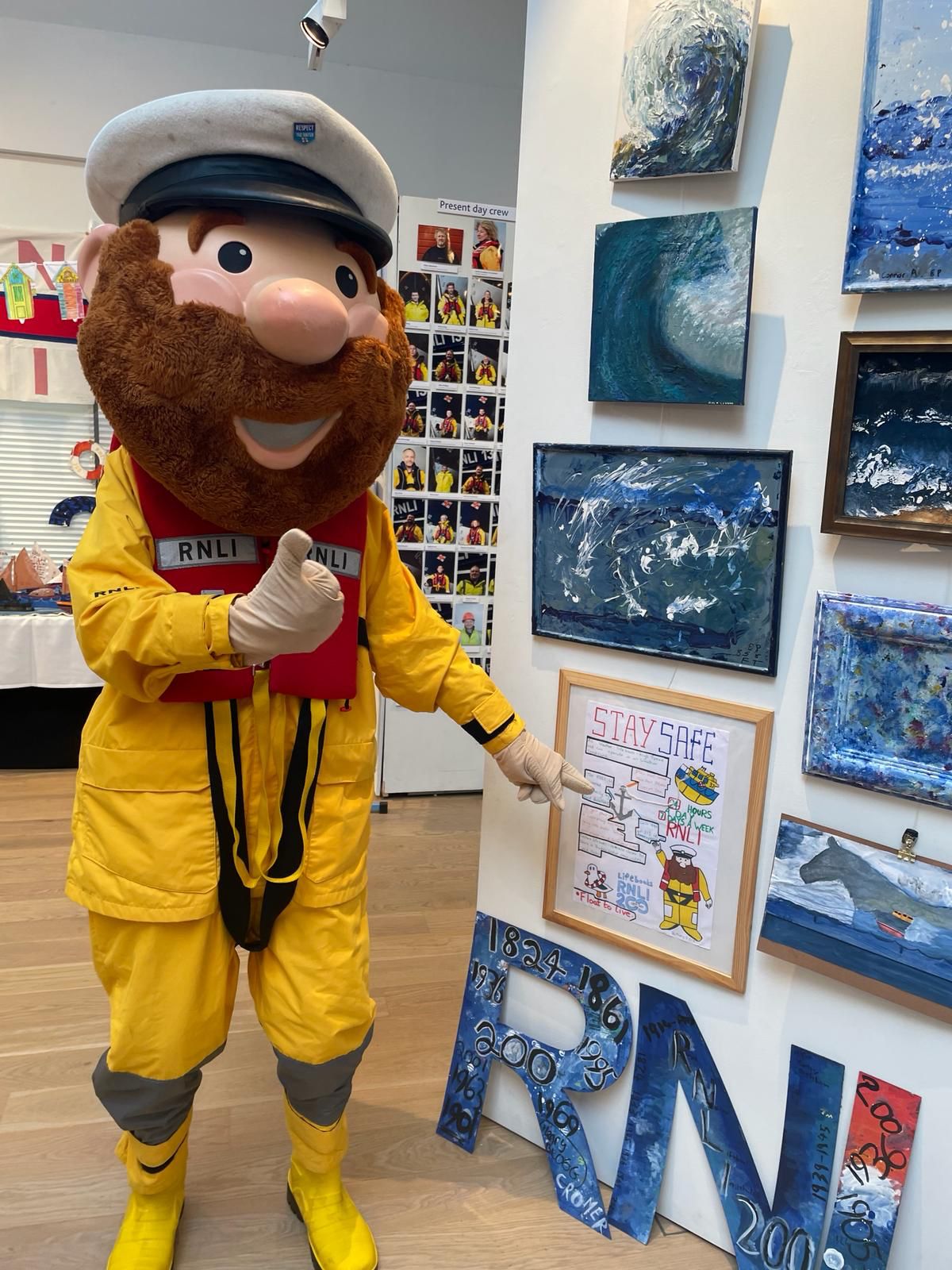 Stormy Stan with some of the children's artwork and good advice