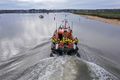 All weather lifeboat with an unusually large crew heading up to the quay on Sunday morning